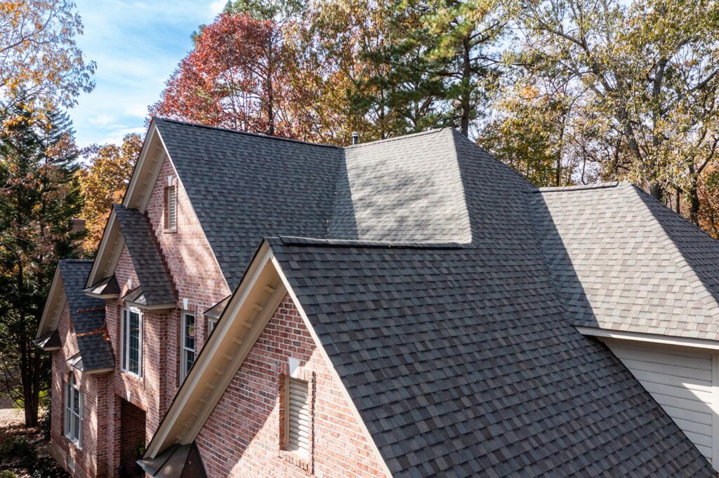 Black roof piece installed after residential roof replacement - roof repair and roof replacement